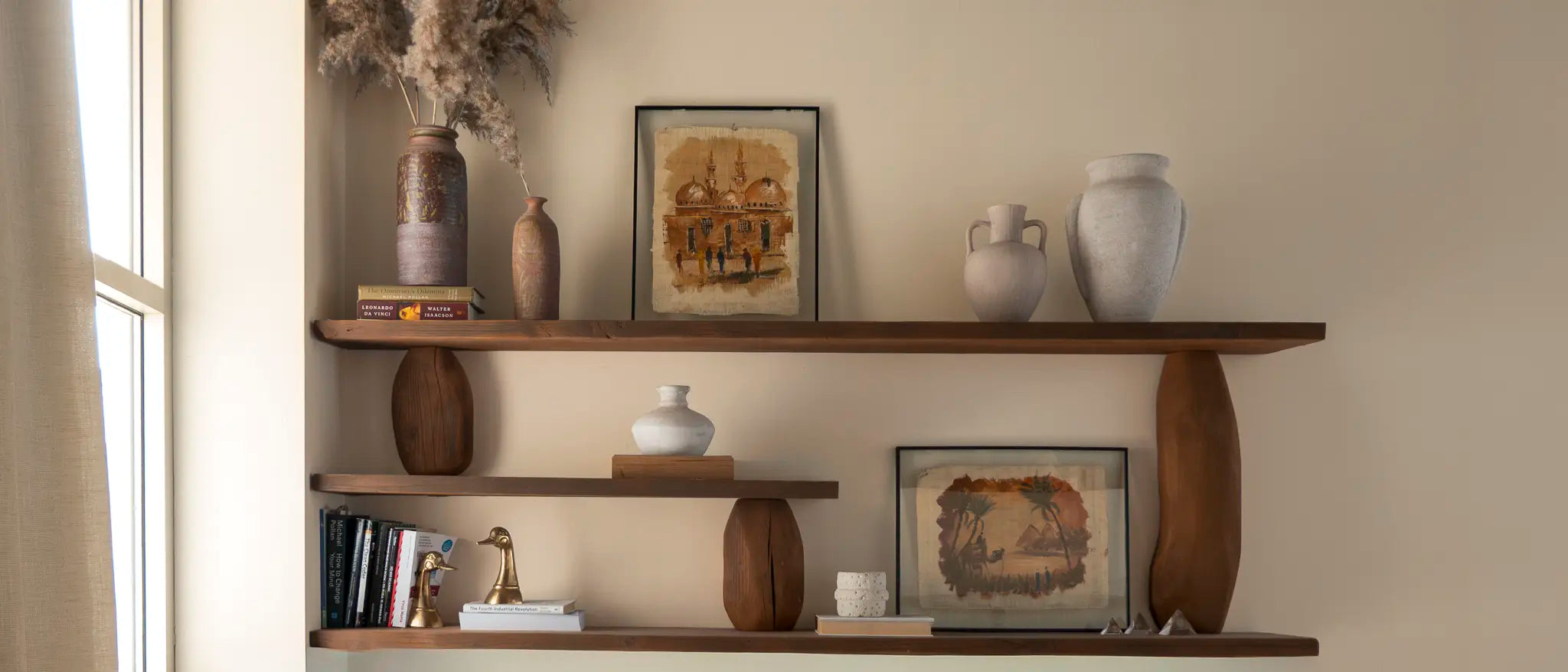 Wide shot of a sun-drenched artisan furniture workshop